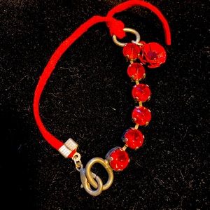 Vintage red crystal gem bracelet with silver tone links and red suede tie